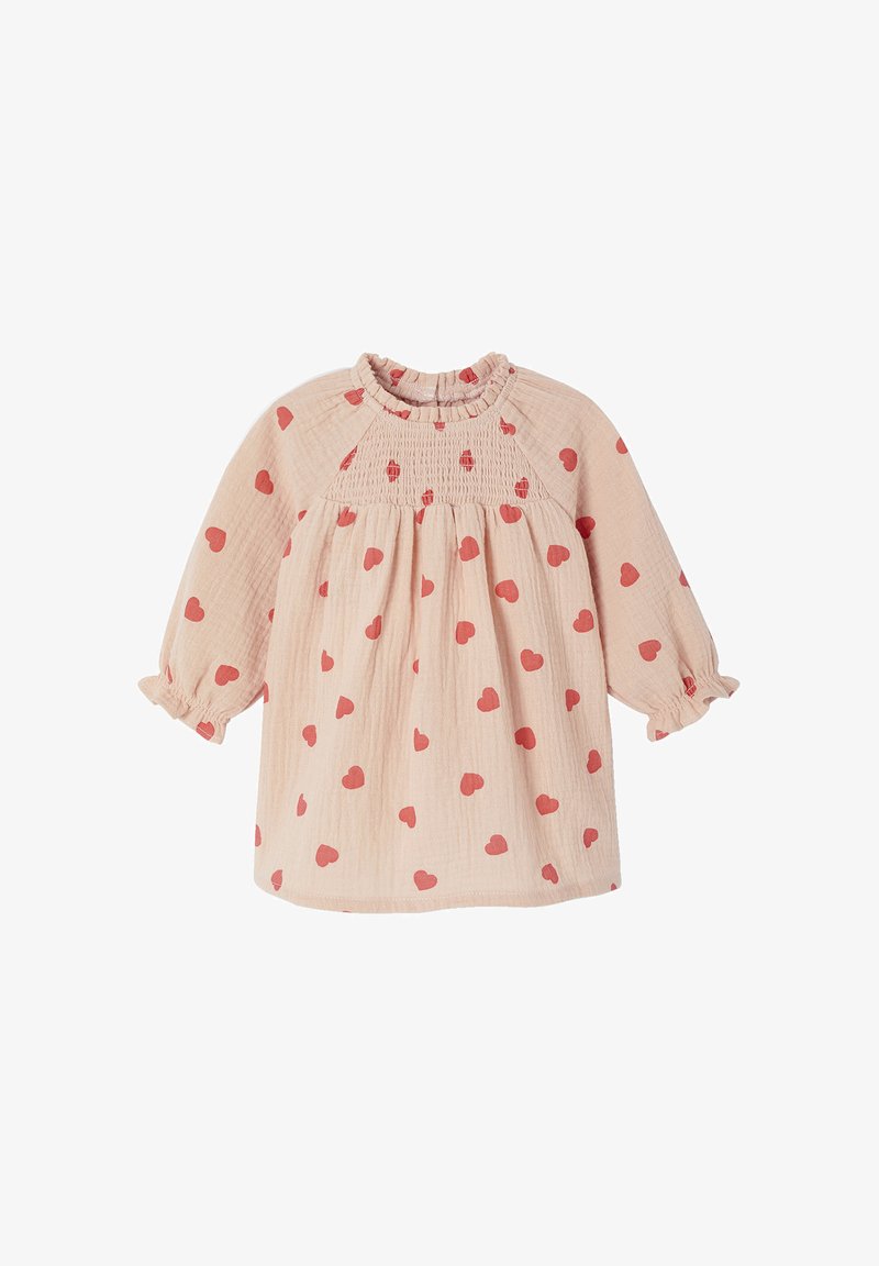 Pfirsichfarbene Bluse mit rotem Herzmuster, gerafftem Ausschnitt und 3/4-Ärmeln. Hergestellt aus leichtem Stoff mit strukturierter Oberfläche.