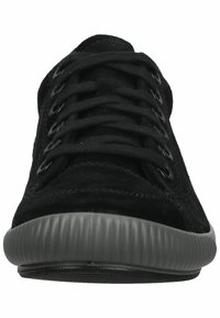 Black suede sneaker with a rounded toe, flat rubber sole, and raised ribbing. Features black laces and metal eyelets. Simple, minimalist design.