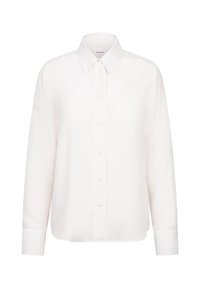 Camicia bianca a maniche lunghe con colletto e polsini a punta, realizzata in tessuto morbido, vista frontale su sfondo neutro.