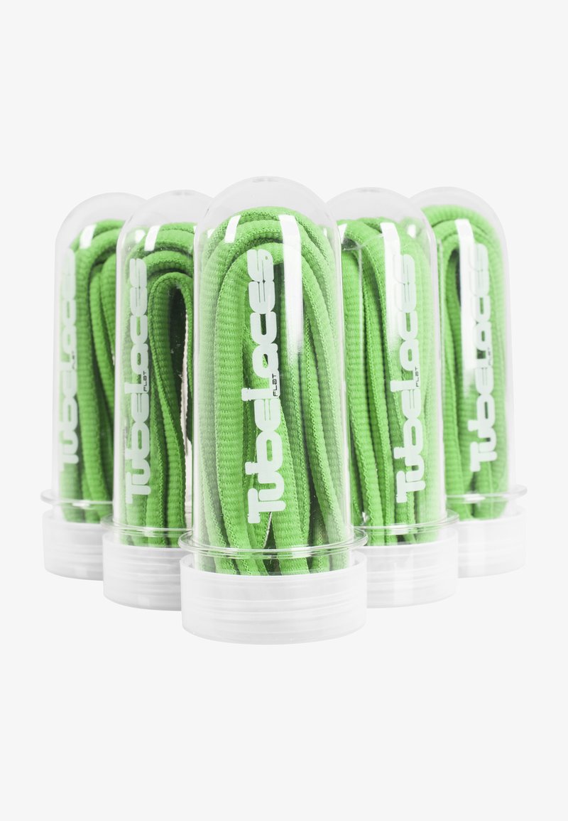 Roheline lamedate kinganöörid, pakitud selgetesse silindrilistesse konteineritesse valge "Tubelaces" brändimisega. Iga nööril on tekstureeritud pind.