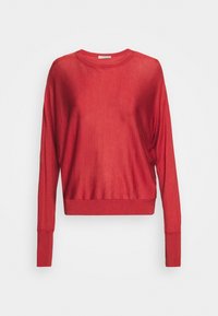 Červený svetr s dlouhým rukávem vyrobený z lehké texturované látky s kulatým výstřihem a přiléhavými manžetami. Zkrácený střih s volným střihem.