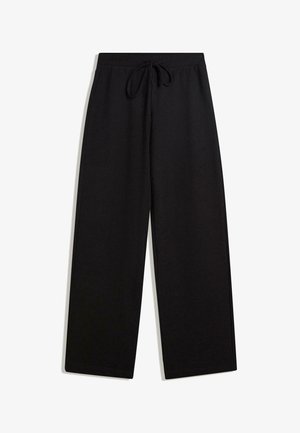 Schwarze weit geschnittene Hose aus weichem Stoff, mit einem Gummizugbund und ohne sichtbare Muster oder Akzente.