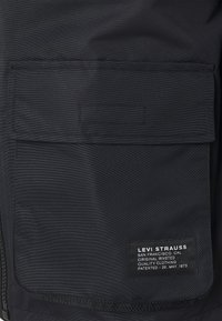 Levi's® Tunn jacka - black