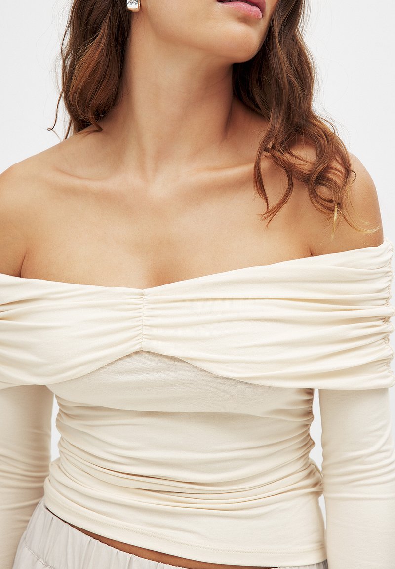 Na Kd White Off The Shoulder Bell Sleeve Top NA-KD Long Sleeved