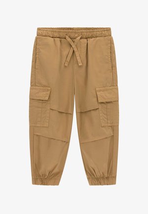 Pantalon cargo beige avec taille et poignets élastiques, poches fendues à l'avant et poches cargo latérales à rabat.