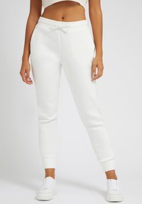 JOGGING - Pantalones deportivos - weiß