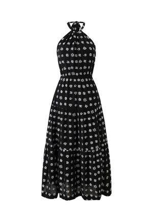 Zwarte halternek maxi-jurk met witte bloemenpatronen, smocked taille en gelaagde rok, gemaakt van lichtgewicht stof.