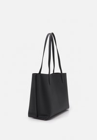 Black faux leather tote bag with two long handles, rectangular shape, smooth texture, and minimalistic design. Closed top with no visible closure.