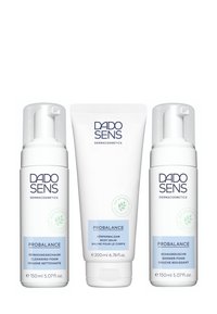 Three DADO SENS PROBALANCE skincare products with white packaging: two cleansing foams and one body balm. Labels feature blue accents and text.