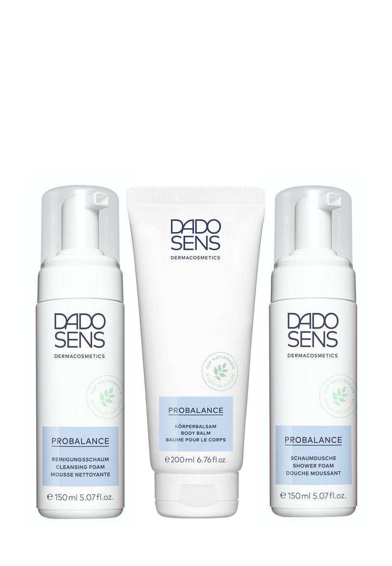 Three DADO SENS PROBALANCE skincare products with white packaging: two cleansing foams and one body balm. Labels feature blue accents and text.