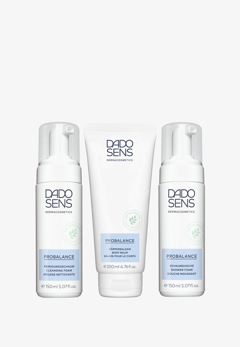 Three DADO SENS PROBALANCE skincare products with white packaging: two cleansing foams and one body balm. Labels feature blue accents and text.