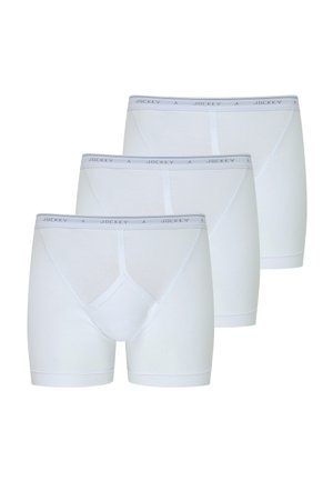 Weiße Boxer-Briefs aus weichem Baumwollmaterial. Verfügt über einen elastischen Bund mit "JOCKEY"-Branding und einem glatten, eng anliegenden Schnitt. Drei-Pack.