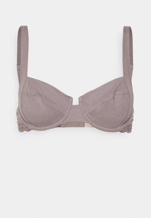 Reggiseno in mauve tenue, con texture a costine, supporto con ferretto e delicati dettagli in pizzo sulla fascia. Spalline regolabili per una vestibilità perfetta.