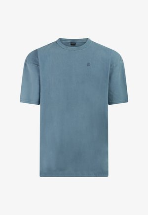 Short-sleeve, faded blue crew neck t-shirt with a small logo on the left chest and visible stitching on the sleeves and hem.