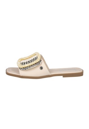 Sandalia plana beige con suela acolchada y lazos decorativos tejidos y transparentes en la tira.