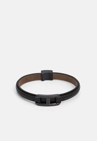 Black leather bracelet with a smooth texture, featuring a rectangular metal clasp and a contrasting brown inner lining.