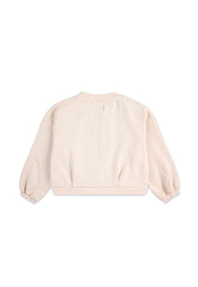Light beige cropped sweatshirt with a round neckline, dropped shoulders, and elastic cuffs. Soft, textured fabric with a smooth finish.