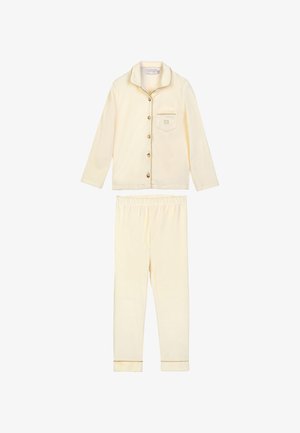 Cream-colored pajamas made of soft fabric. Includes a button-up long-sleeve top with pocket and matching elastic waistband pants with cuffs.