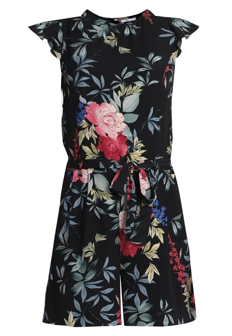 Combinaison noire sans manches avec imprimé floral rose, rouge, bleu et jaune et ceinture assortie en tissu nouée à la taille.