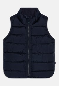 Námořnická puffer vesta s vysokým límcem, zapínán�ím na zip vpředu a vertikálním prošíváním. Měkká textura s zaobleným lemem a bočními panely.