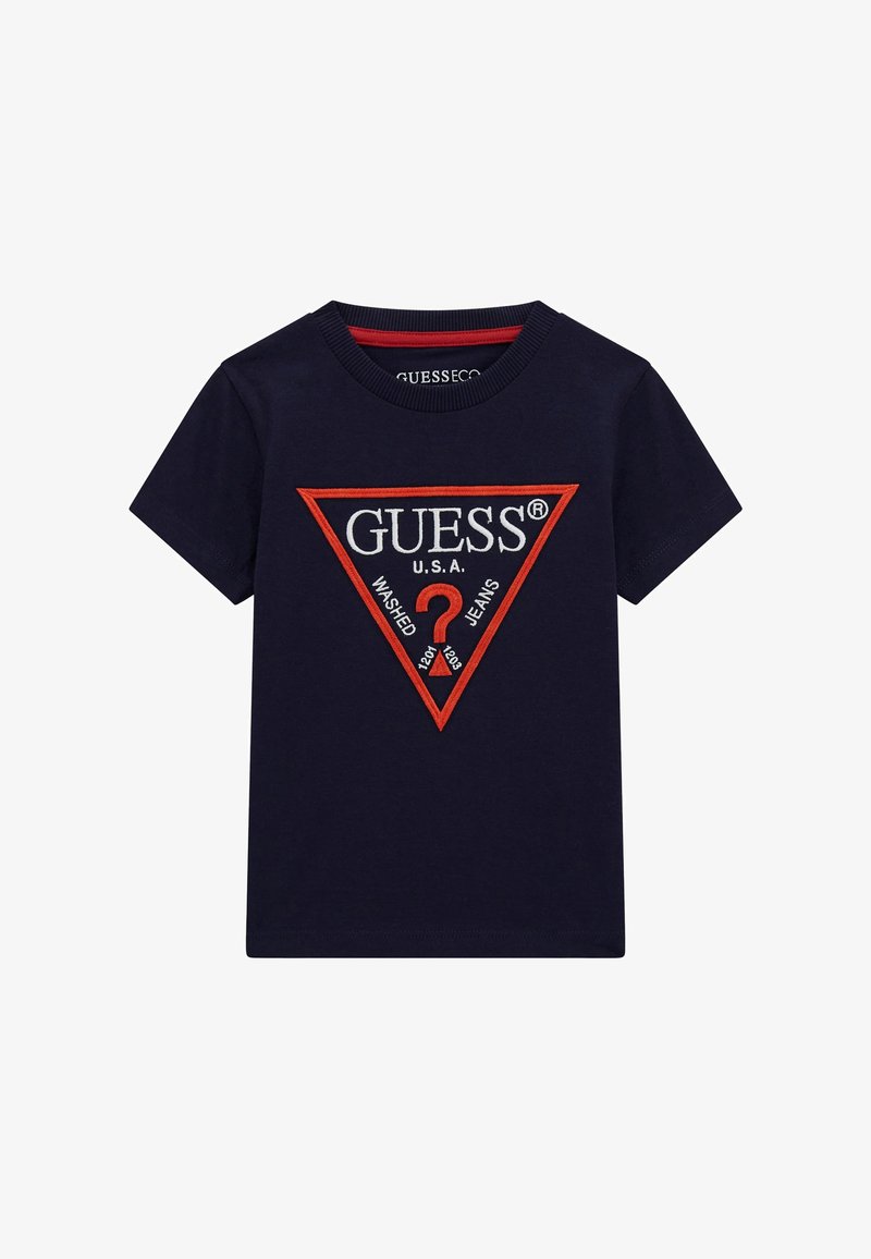 Navyblå bomulds-T-shirt med et rødt og hvidt trekantet logo med teksten "GUESS U.S.A." og "WASHED JEANS", struktureret broderi.