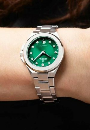 Watch - vert