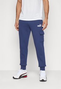 Puma CARGO PANTS - Pantalones deportivos - peacoat