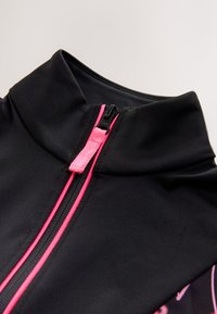 Black athletic jacket with a high collar, featuring a pink zipper and accent seams. Smooth texture with a fitted design.