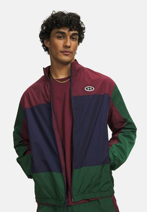 Under Armour, ICON WOVEN TRACK - Training jacket - forest green