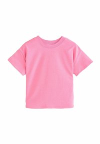 T-shirt rosa a maniche corte realizzato in cotone. Presenta un collo rotondo e una vestibilità rilassata. Texture liscia senza motivi o dettagli visibili.