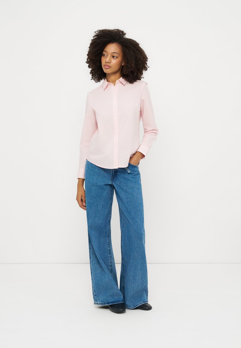 Blusa abotonada