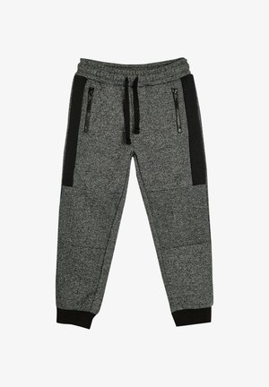 Pantalones de chándal grises con una textura jaspeada, que presentan paneles laterales negros, dos bolsillos con cremallera, una cinturilla elástica y puños acanalados.
