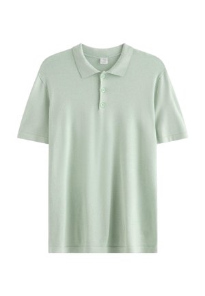 Lysegrøn kortærmet poloshirt med krave og tre knapper foran, vist på hvid baggrund.