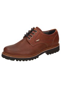 Scarpa stringata in pelle marrone con punta arrotondata, suola in gomma testurizzata, accento blu a contrasto e dettagli di cucitura visibili.
