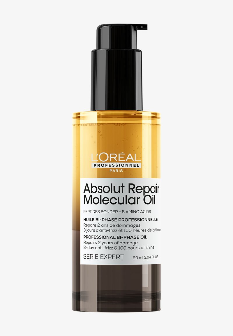 L'Oréal Professionnel Absolut Repair Molecular Oil i en klar flaske med en svart pumpe, som blander amber- og bruntoner. 90 ml.