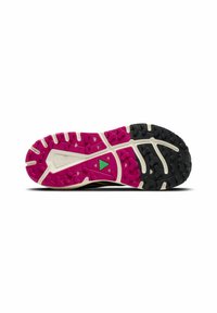 Trail running shoe outsole features a vivid pink and black rubber pattern with deep treads and a green accent logo, designed for grip and traction.