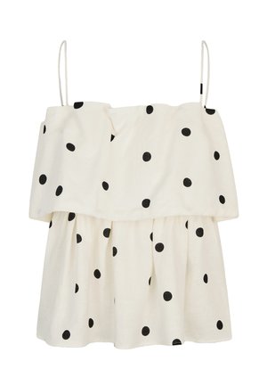 Valkoinen hihaton mekko, jossa ohuet hihnat, löysä istuvuus ja musta pilkkukuosi koko mekon alueella.