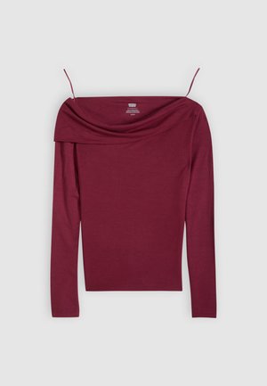 Bordó hosszú ujjú felső vállakat szabadon hagyó kialakítással és puha textúrával. Vékony pántokkal és redőzött nyakkivágással rendelkezik. Könnyű anyagból készült.