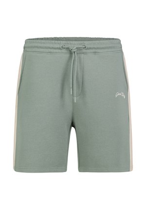 Green drawstring shorts with beige side stripes and front pockets, featuring small white "Good Stuff" text on the left thigh.