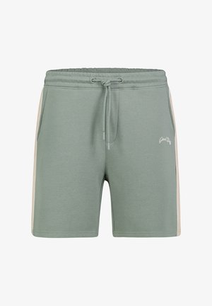 Green drawstring shorts with beige side stripes and front pockets, featuring small white "Good Stuff" text on the left thigh.