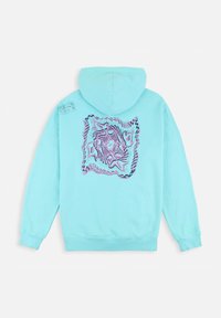 Pull-over turquoise avec un design graphique texturé en rose et violet au dos et une petite étiquette logo sur l'épaule gauche.