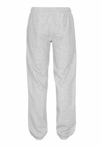 Helle graue Jogginghose mit elastischem Bund, lockerer Passform, gerippten Bündchen und einem weichen, strukturierten Stoff. Keine sichtbaren Taschen oder Logos.