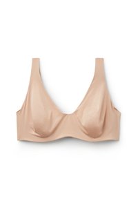 Beige, draadloze beha van zachte stof met soepele cups. Beschikt over brede banden en een naadloos ontwerp voor comfort en ondersteuning.