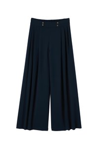 Pantalon large bleu marine avec plis, taille haute avec quatre boutons décoratifs, et détail élastique à l'arrière.