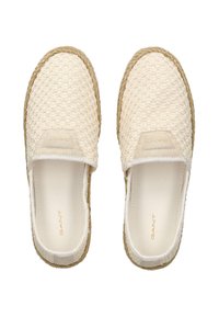 Espadrilles trenzadas en crema con un upper texturizado, detalles de yute alrededor de la suela y un suave forro interior, que cuentan con un sutil logo de la marca.