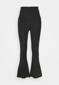 Svart utsvängda leggings i ett stretchigt material. Har en hög midja och en slät yta med en åtsittande design genom låret.