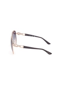 Solglasögon med rund, gråtonad lins, ram med guldfinish och svarta texturerade skalmar med ett varumärkessynliggörande.