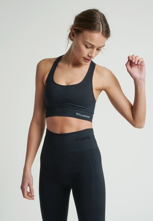 SEAMLESS - Medium support sports bra - black