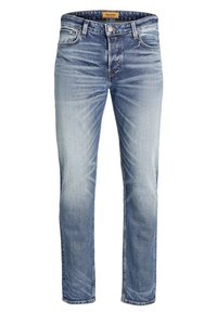 Ljusblå denimjeans med rak bendesign, som har en urblekt yta, fem fickor och kontrasterande sömmar. Midjan har en etikett.