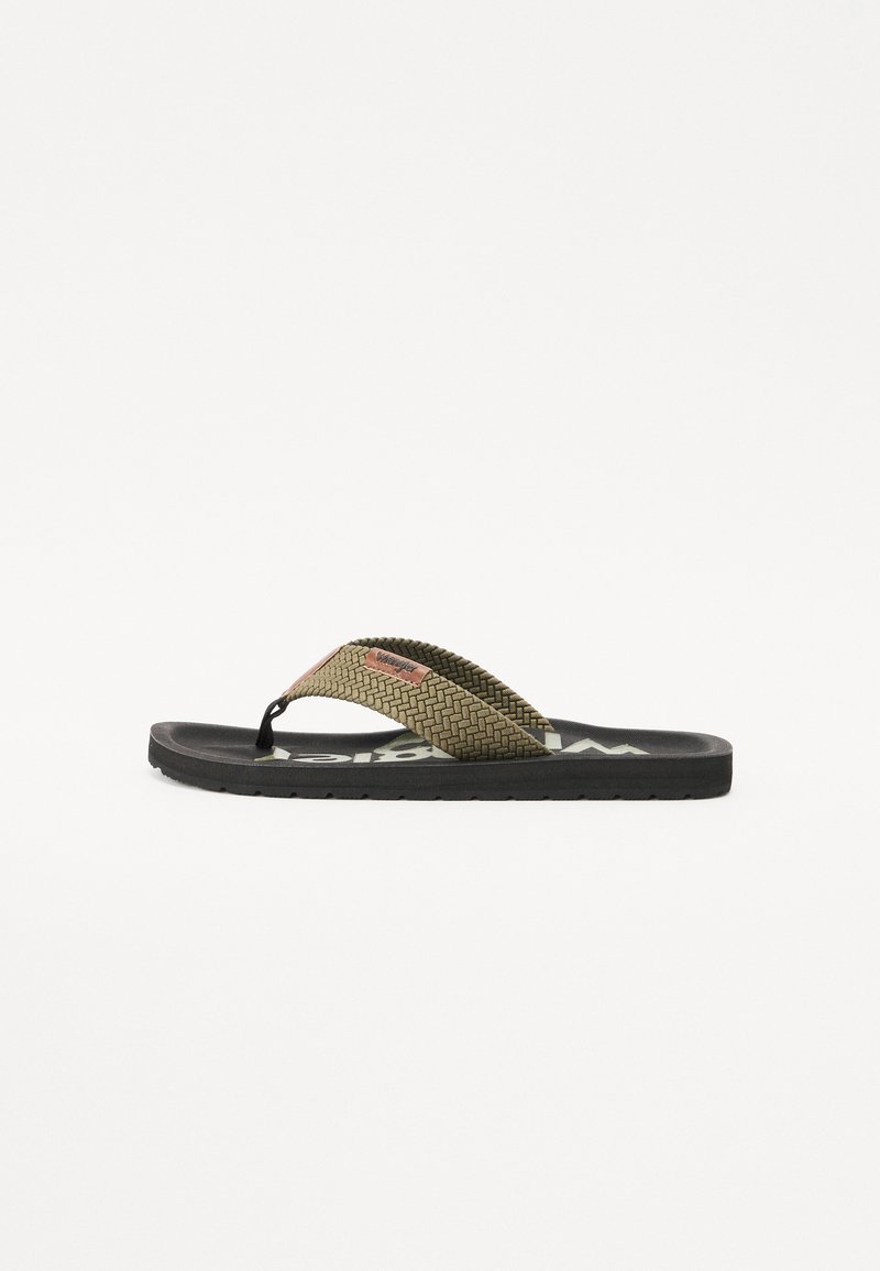 Black flip-flop featuring woven olive green straps with a textured finish and logo detail, set on a flat black rubber sole.